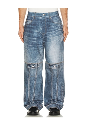 Andersson Bell Custom-Like Printed Denim Pants in Blue. Size 30. Also in 32, 34, 36.