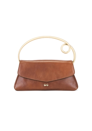 Cult Gaia Emily Top Handle Bag in Brown.
