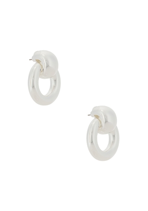 Jenny Bird Mega Faye Knockers Drop Earrings in Metallic Silver.