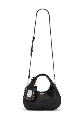 Ganni Grained Mini Hobo Bag in Black.