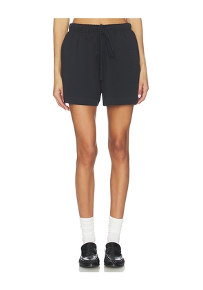 Fear of God ESSENTIALS Soccer Short in Black. Size L. Also in M, S, XS.