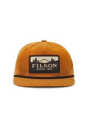 Filson Waxed Trucker Cap in Brown.