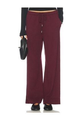 SIMKHAI Travel Pant in Red. Size L. Also in S.