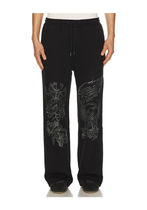Jungles Loud Noises Track Pant in Black. Size L. Also in S, M, XL/1X.