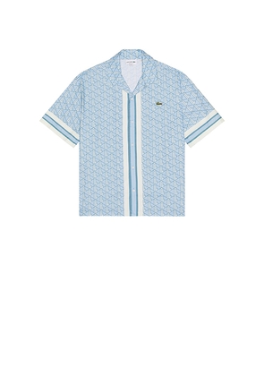 Lacoste Monogram Shirt in Baby Blue. Size 44. Also in 38.