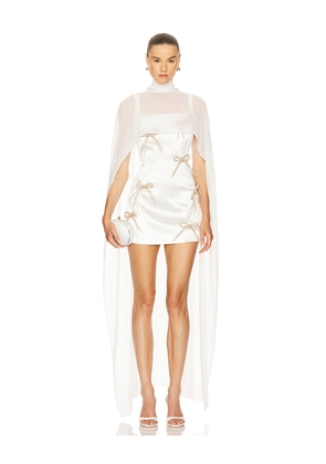 Milkwhite x REVOLVE Cape in White.