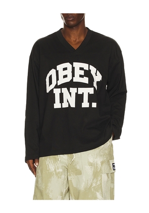Obey Long Sleeve Football Jersey in Black. Size L. Also in S, M, XL/1X.