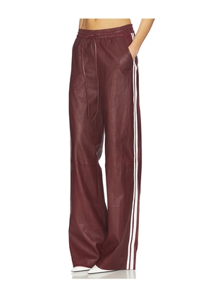 SPRWMN Baggy Athletic Striped Sweatpants in Burgundy. Size L. Also in S, XS.
