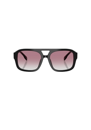 Tory Burch Aviator Sunglasses in Black.