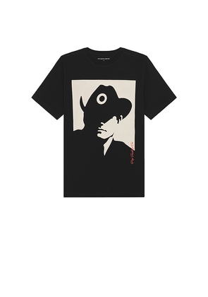 Pop Trading Company Man Tee in Black. Size L. Also in S, M, XL/1X.