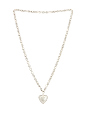 Roxanne Assoulin Mini Puffy Heart Necklace in Metallic Silver.