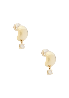 SHASHI Spencer Huggie Earring in Metallic Gold.
