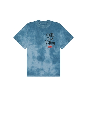 UPRISERS x REVOLVE Hate Is A Virus Washed Tee in Blue. Size L. Also in M, XL/1X.