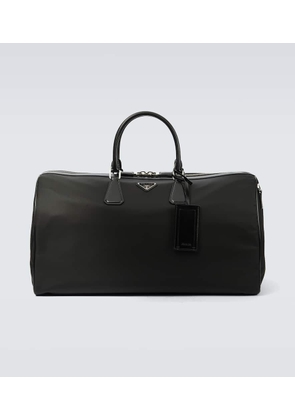Prada Leather-trimmed duffel bag