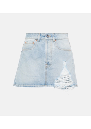 Vetements Distressed denim miniskirt