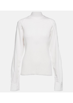 Toteme Ribbed-knit turtleneck wool-blend top
