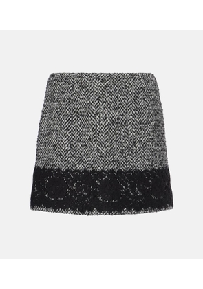 Dolce&Gabbana Lace-trimmed tweed miniskirt