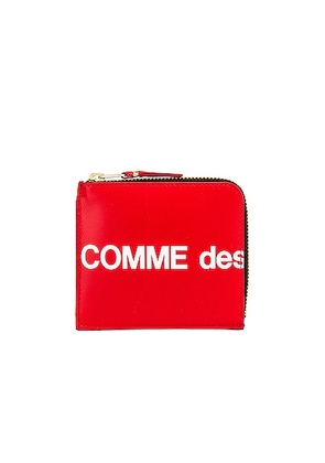 COMME des GARCONS Huge Logo Wallet in Red - Red. Size all.