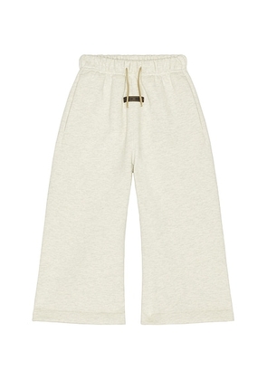 Fear of God ESSENTIALS Kids Flare Sweatpant in Oatmeal Heather - Grey. Size 2/3 (also in 4/5, 6/7).