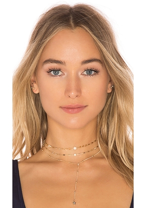 Ettika Forever Falling Multi-Chain Lariat Choker in Metallic Gold.