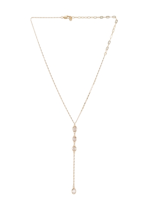 Ettika Sparkle Dip Lariat in Metallic Gold.