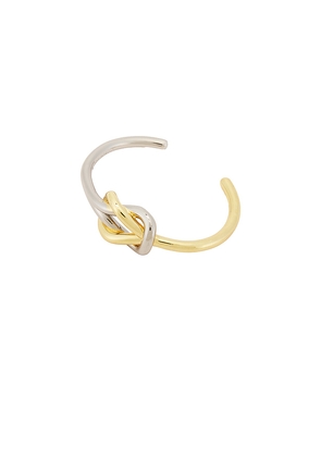 Eddie Borgo Slipknot Cuff in Metallic Gold,Metallic Silver.
