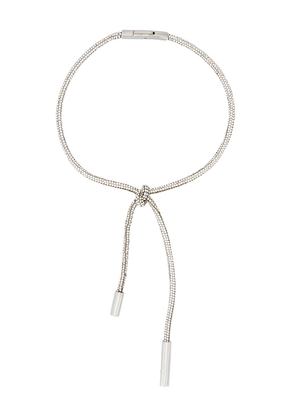 AREA Crystal Knot Necklace in Metallic Silver.