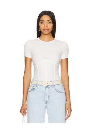 fleur du mal T-Shirt Bodysuit in White. Size M. Also in XS, XL.