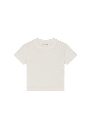 Fear of God ESSENTIALS Kids Essential Tee in Ivory. Size 2/3. Also in 4/5, 6/7.