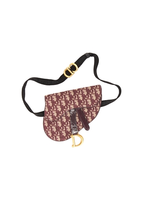 FWRD Renew Dior Oblique Saddle Belt Bag in Red.