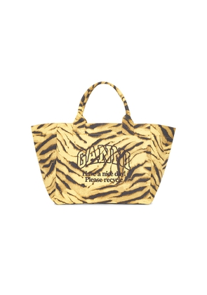 Ganni Shopper XXL Pocket Print Tote Bag in Brown.