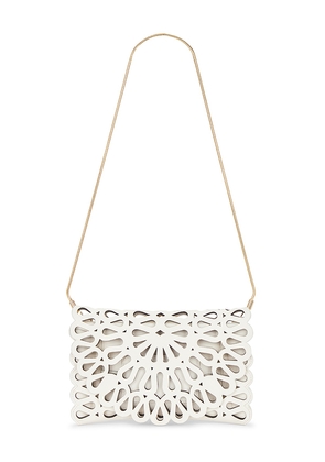SIMKHAI Mccall Laser Cut Clutch in Cream.