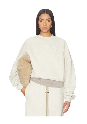 Fear of God ESSENTIALS 90's Raglan Sweatshirt in Cream. Size L. Also in S, M, XL.