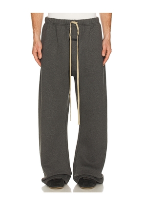 Fear of God ESSENTIALS Flare Sweatpant in Black. Size L. Also in XS, S, M, XL/1X, XXL/2X.