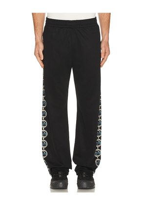Pleasures Mythic Hope Track Pants in Black. Size L. Also in S, M, XL/1X.