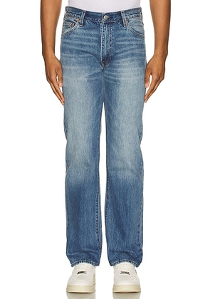 LEVI'S 555 Relaxed Straight Jeans in Indigo Champion - Denim-Medium. Size 32 (also in ).