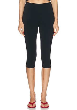 Toteme Compact Knit Capri Trouser in Black - Black. Size M (also in ).