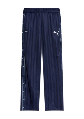 PUMA x Guizio striped logo-print pants - Blue