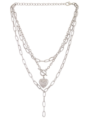 petit moments Harp Necklace in Metallic Silver.