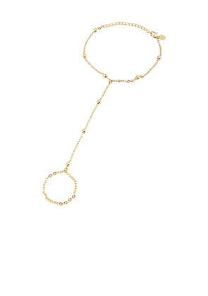 petit moments Sol Hand Chain Bracelet in Metallic Gold.
