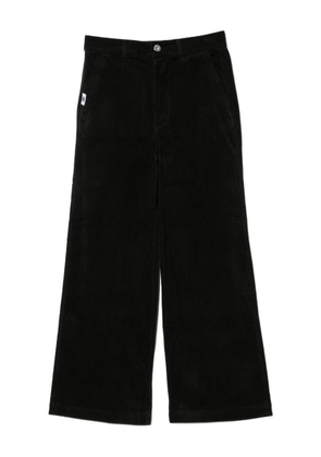CHOCOOLATE logo-patch trousers - Black