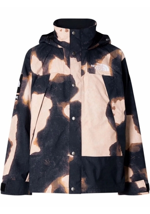 Supreme x The North Face bleached denim-print mountain jacket - Brown