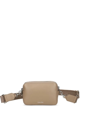 Calvin Klein embossed logo crossbody bag - Neutrals