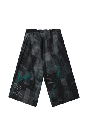 Y's graphic-print wide-leg trousers - Black