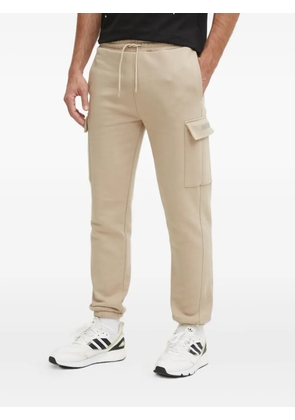 GUESS USA logo-plaque cargo track pants - Neutrals