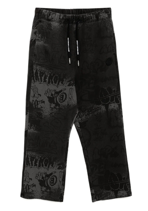 AAPE BY *A BATHING APE® graffiti-print track pants - Black