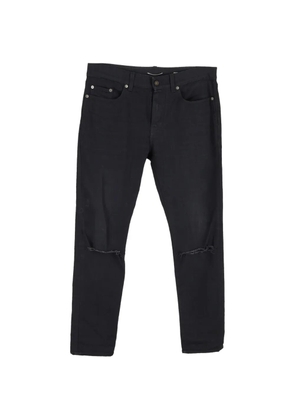 Saint Laurent Pre-Owned 2016 knee-ripped jeans - Black