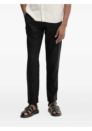 Marc O'Polo logo-patch trousers - Black