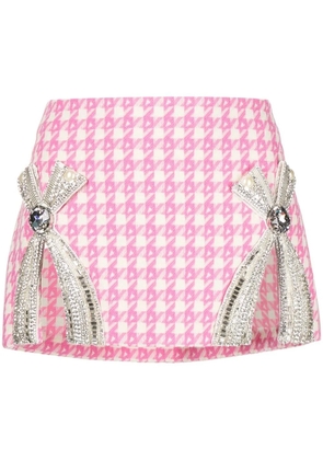 AREA crystal-embellished bow detail miniskirt - Pink