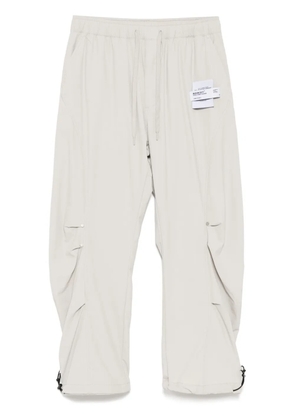 Musium Div. logo-patch trousers - Neutrals